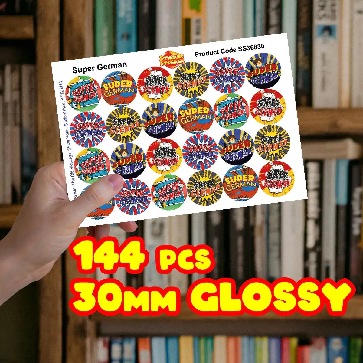 Hand holding sheet of Super German reward stickers, 144 pieces, 30mm glossy finish.