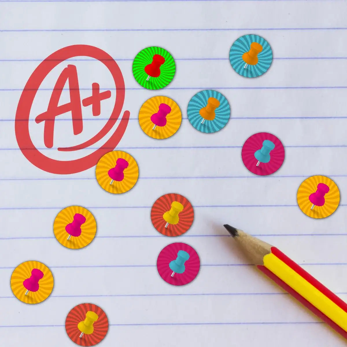 Colorful push pin reward stickers on lined notebook paper with an A+ and pencil