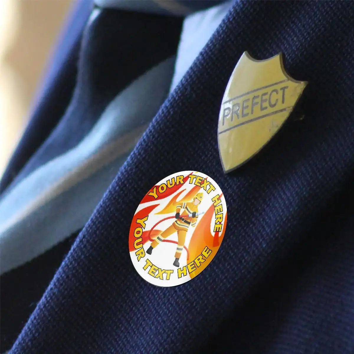Custom reward sticker with firefighter illustration and prefect badge on school blazer