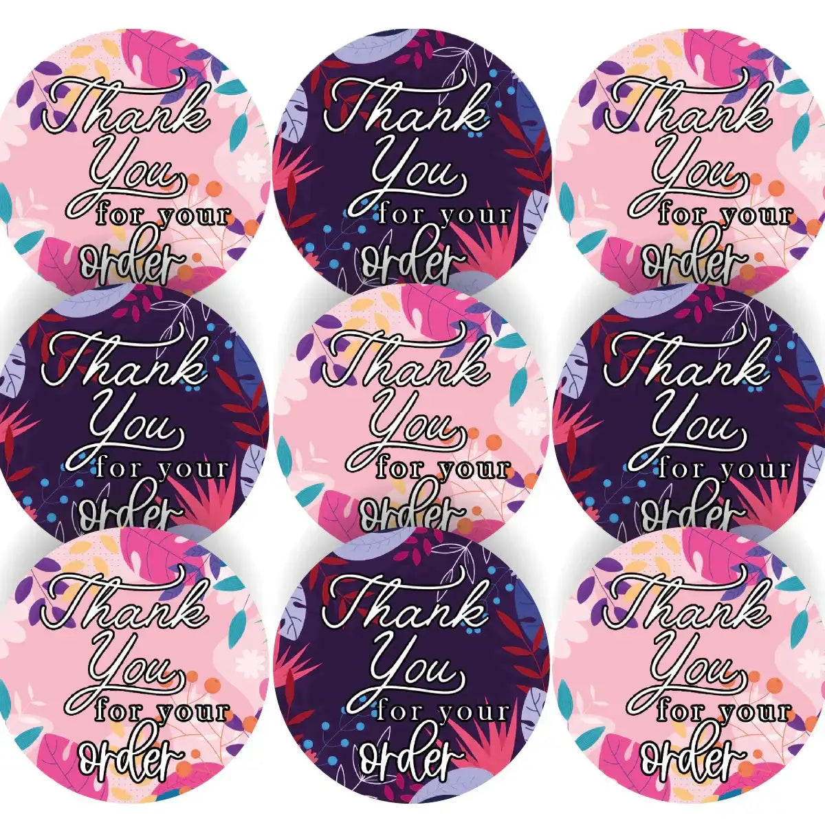 Round thank you for your order stickers with colorful floral patterns in pink and purple.