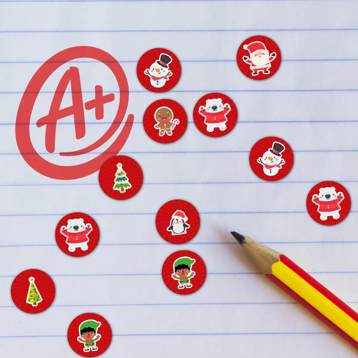 Christmas reward stickers on lined paper with pencil and red A+ mark