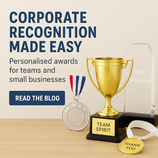 Corporate recognition awards including gold trophy, medals, and glass plaque on desk