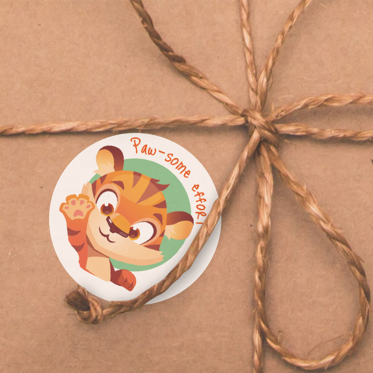 Cute tiger reward sticker with 'Paw-some effort' on brown wrapped gift, classroom motivation
