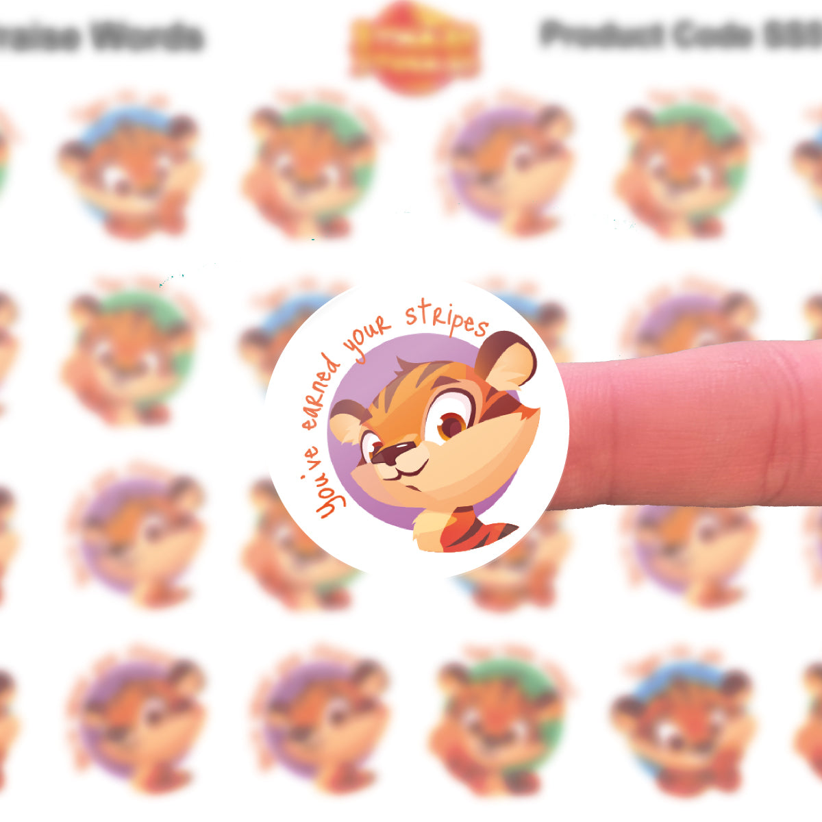 Reward sticker with cartoon tiger and 'you've earned your stripes' on a finger, classroom setting