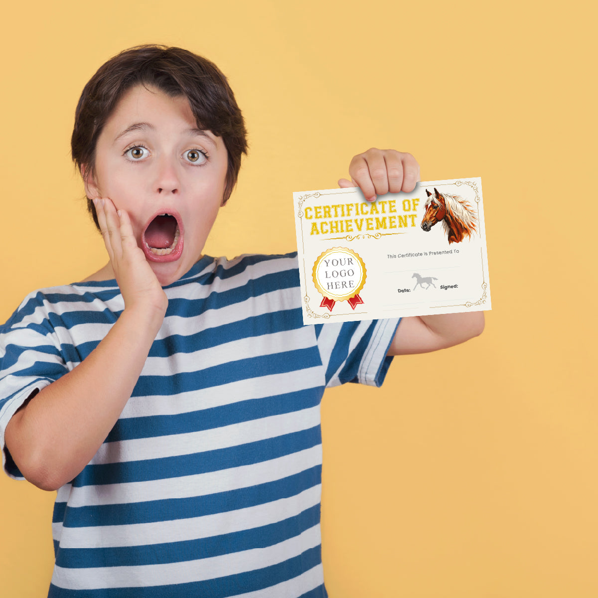 Surprised boy holding a certificate of achievement with horse graphic, striped shirt, yellow background